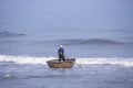 Da Nang, Vietnam, January 16, 2020, Vietnamese fisherman flying inside a round bamboo Royalty Free Stock Photo